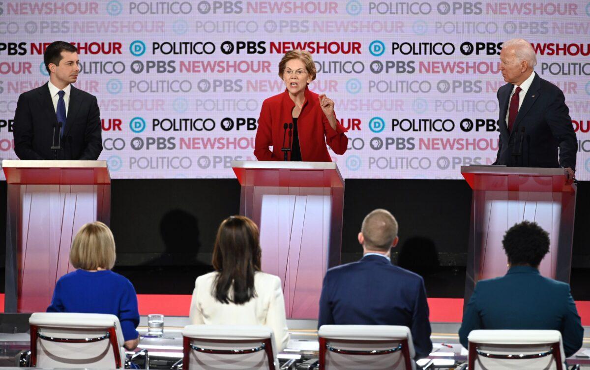 From left, Democratic presidential hopefuls South Bend Mayor Pete Buttigieg, Sen. Elizabeth Warren (D-Mass.), and former Vice President Joe Biden take part in the sixth Democratic primary debate of the 2020 presidential campaign season at Loyola Marymount University in Los Angeles, California on Dec. 19, 2019. (Robyn Beck/AFP via Getty Images)