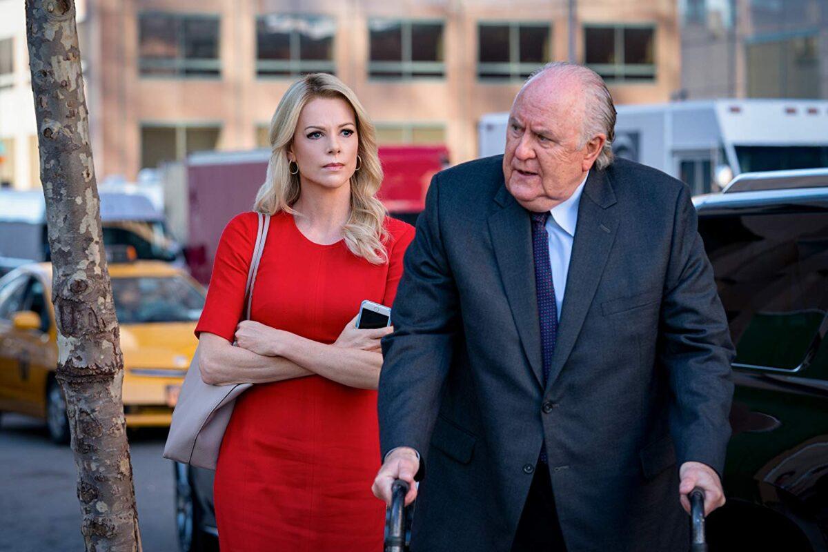 Charlize Theron and John Lithgow in “Bombshell.” (Hilary B. Gayle/Lionsgate)