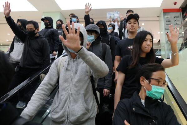 Hong Kong protesters march in Harbour City shopping mall in Hong Kong, China, December 21, 2019. (Reuters/Lucy Nicholson)