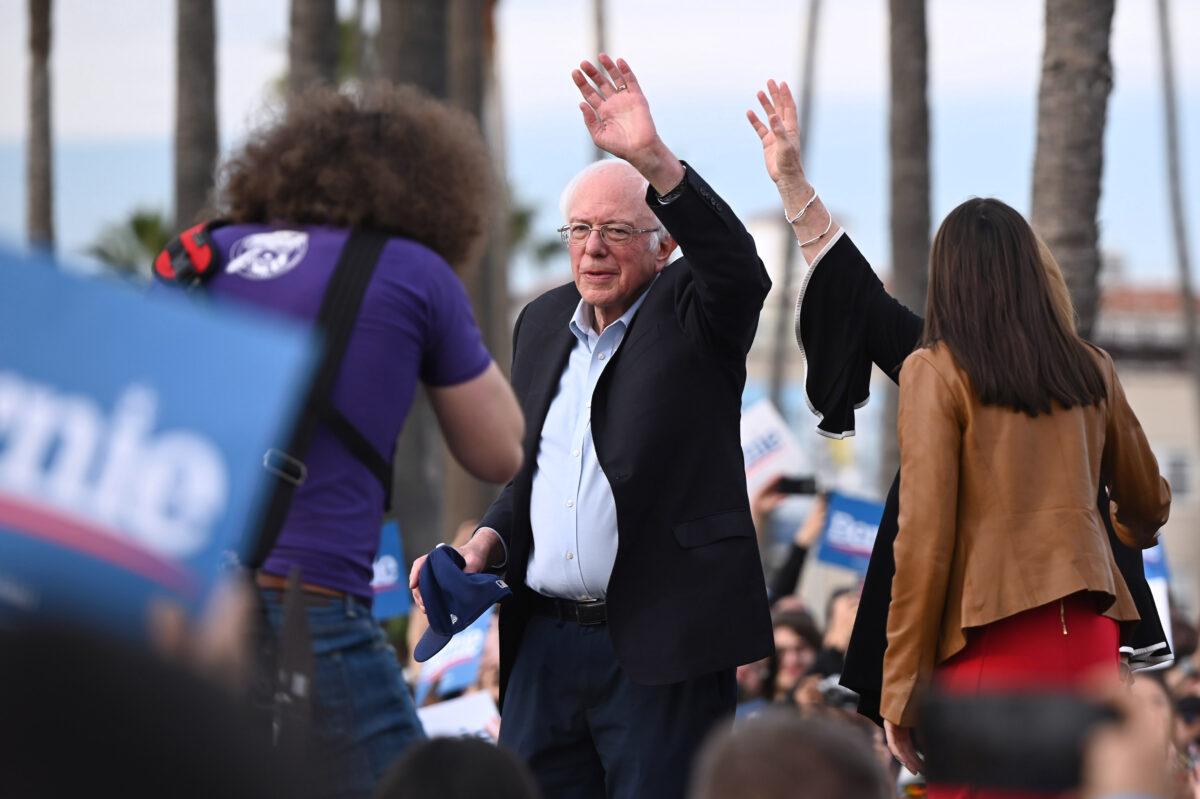 Democratic presidential candidate Sen. Bernie Sanders (I-Vt.) waves during a rally in the Venice Beach neighborhood of Los Angeles, Calif., on Dec. 21, 2019. (Robyn Beck/AFP via Getty Images)