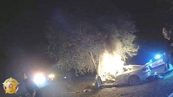 A 20-year-old became trapped in a burning car after he fell asleep at the wheel and crashed into a tree on Dec. 8, 2019. (The Harris County Constable’s Office)