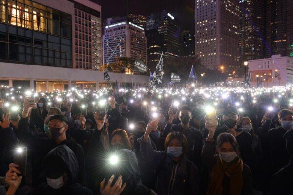 Protesters take part in a rally to support nonprofit Spark Alliance in a rally at Edinburgh Place in Hong Kong on Dec. 23, 2019. (Sung Pi-lung/The Epoch Times)