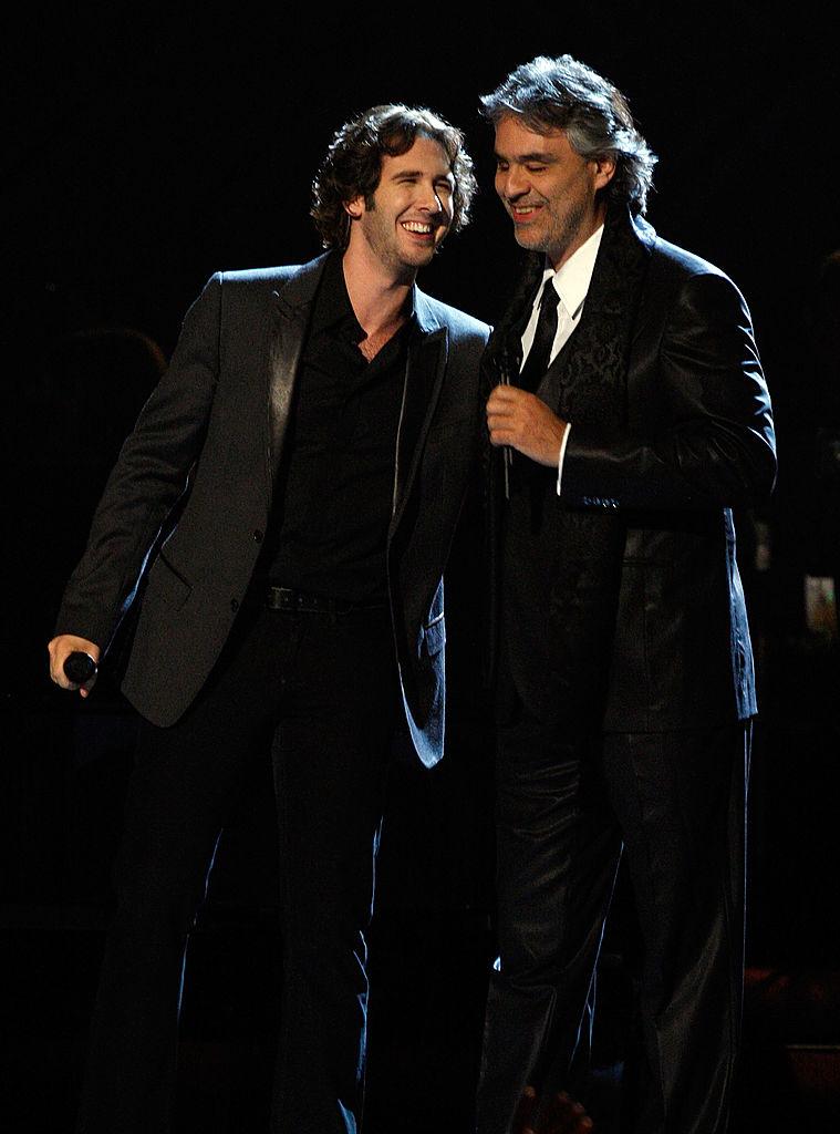 Groban and Bocelli enjoying a moment together onstage during the 50th annual Grammy awards held at the Staples Center in Los Angeles, California, on Feb. 10, 2008 (©Getty Images | <a href="https://www.gettyimages.com/detail/news-photo/singers-josh-groban-and-andrea-bocelli-perform-onstage-news-photo/79697097?adppopup=true">Kevin Winter</a>)