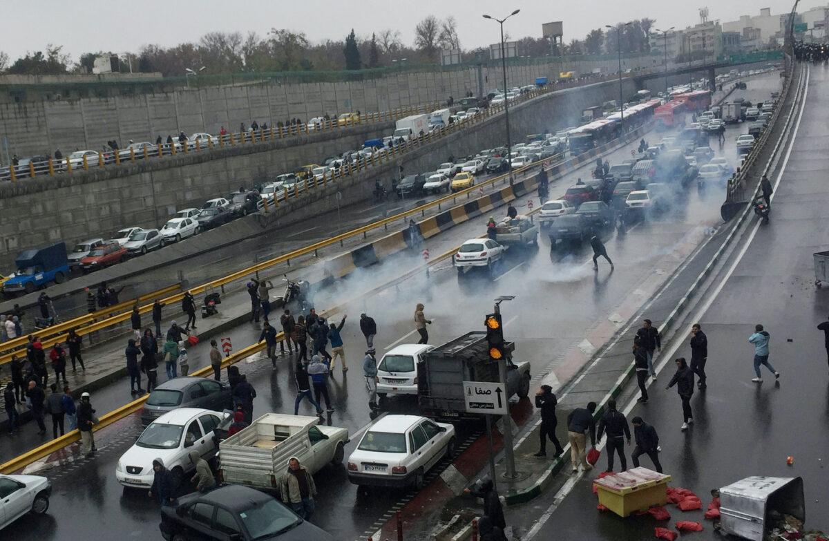 People protest against increased gas prices, on a highway in Tehran, Iran, on Nov. 16, 2019. (Nazanin Tabatabaee/WANA (West Asia News Agency) via Reuters)