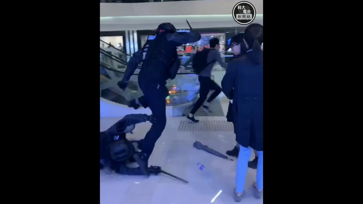A man tries to evade police at Yuen Long mall in Hong Kong, China on Dec. 24, 2019 in this still image taken from the social media video. (Courtesy of HKUST Radio News Reporting Team/via Reuters)