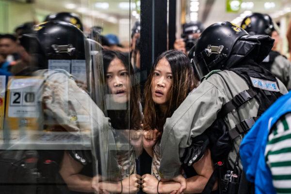  A resident is detained by riot police during a rally in Hong Kong on Nov. 3, 2019. (Anthony Kwan/Getty Images)
