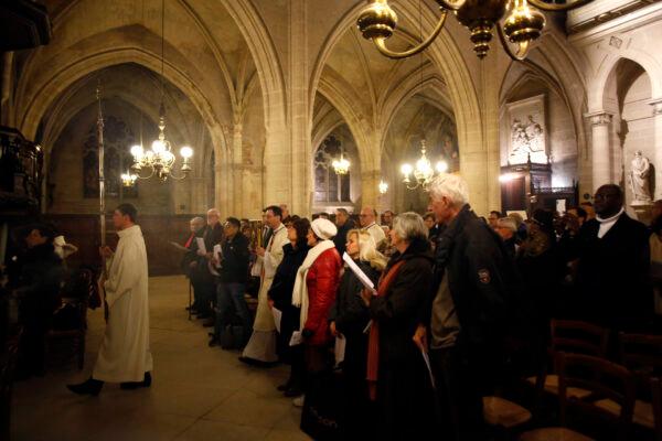 Believers at Christmas mass in Saint-Germain l'Auxerrois church in Paris on Dec. 24, 2019. (Thibault Camus/AP Photo)