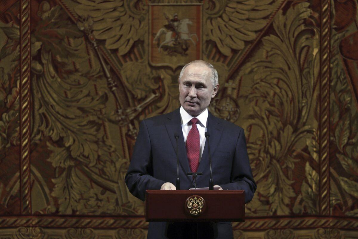 Russian President Vladimir Putin delivers his speech at a gala on the occasion of the New Year at the Bolshoi Theater in Moscow on Dec. 26, 2019. (Mikhail Metzel, Sputnik, Kremlin Pool Photo via AP)