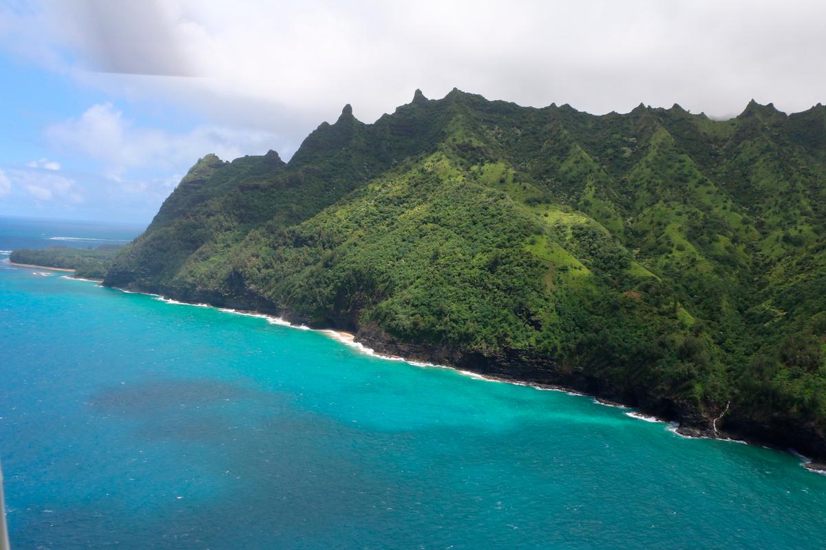 An area over Napali Coast State Wilderness Park where search and rescue are searching for a tour Helicopter that disappeared in Hawaii with several people aboard on Dec. 27, 2019. (Dan Dennison/Hawaii Department of Land and Natural Resources via AP)