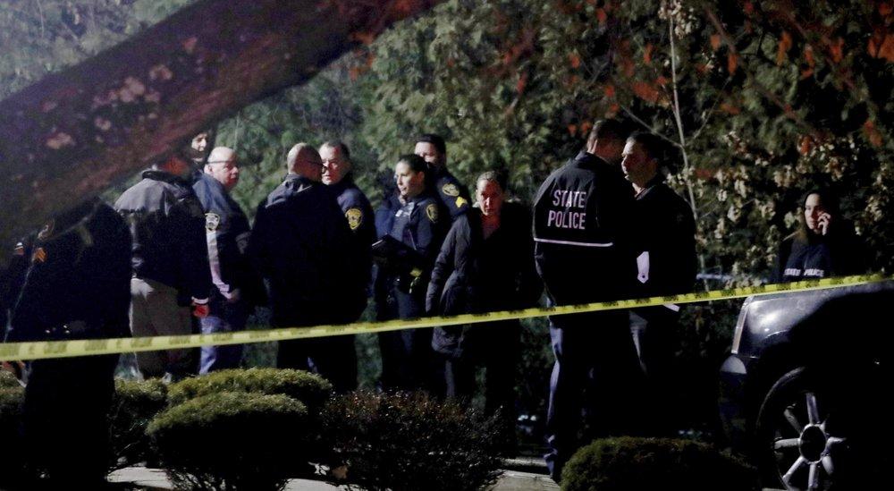 Police gather outside the residence in Monsey, N.Y., early Sunday, Dec. 29, 2019, following a stabbing Saturday during a Hanukkah celebration. (Seth Harrison/The Journal News via AP)