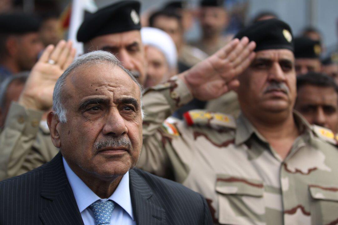 Amid Deadly Protests, Embattled Iraqi Government Condemns US Air Strikes on Iran-Backed Forces