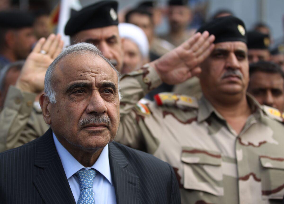 Iraq's Prime Minister Adel Abdel Mahdi speaks during a symbolic funeral ceremony in Baghdad on Oct. 23, 2019. (Ahmad Al-Rubaye/AFP Via Getty Images)