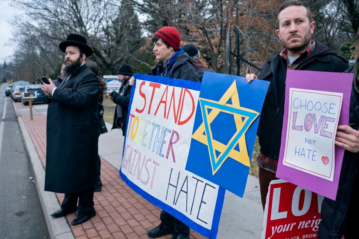 Neighbors gather to show their support of the community near a rabbi's residence in Monsey, N.Y. on Dec. 29, 2019, following a stabbing Saturday night during a Hanukkah celebration. (Craig Ruttle/AP Photo)