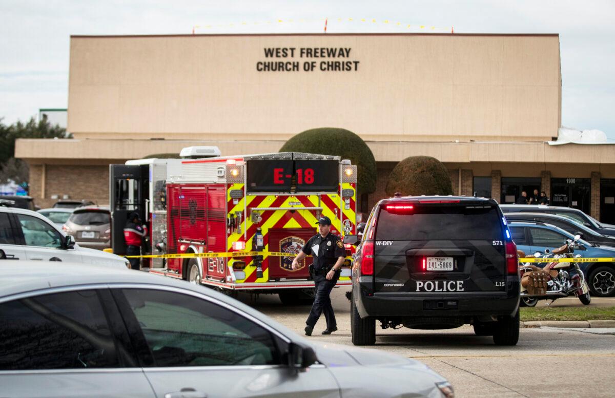 Police and fire department surround the scene of a shooting at West Freeway Church of Christ in White Settlement, Texas on Sunday, Dec. 29, 2019. (Yffy Yossifor/Star-Telegram via AP)