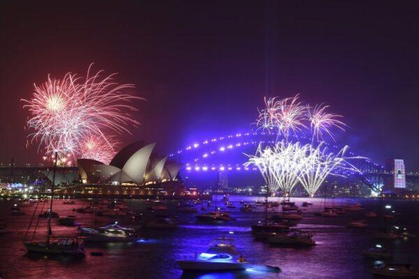 Fireworks are seen from Mrs. Macquarie's Chair during New Year's Eve celebrations in Sydney, Tuesday, Dec. 31, 2019. (Mick Tsikas/AAP Image via AP)