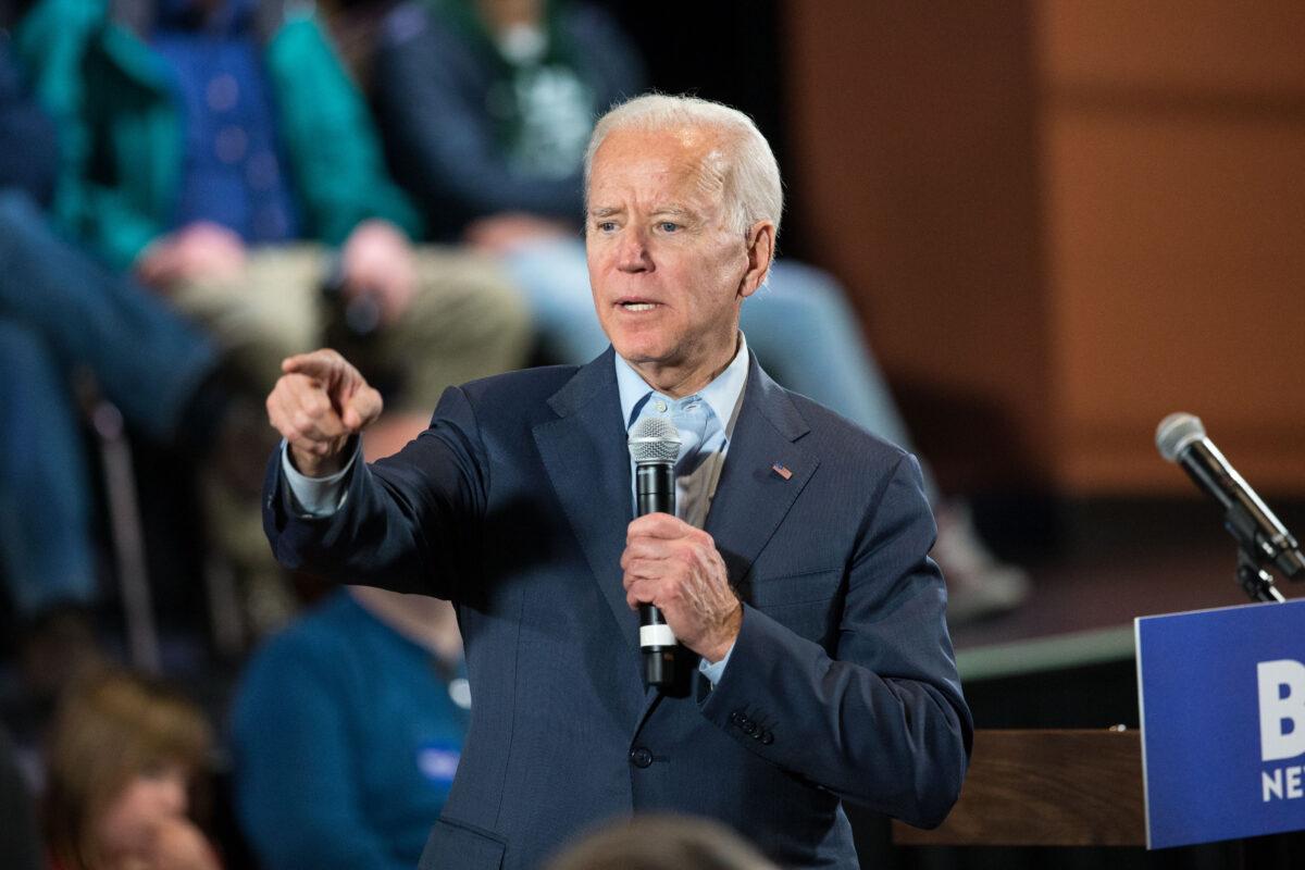Democratic presidential candidate, former Vice President Joe Biden points to a member of the crowd who wanted to ask a question during a campaign Town Hall in Derry, N.H., on Dec. 30, 2019. (Scott Eisen/Getty Images)