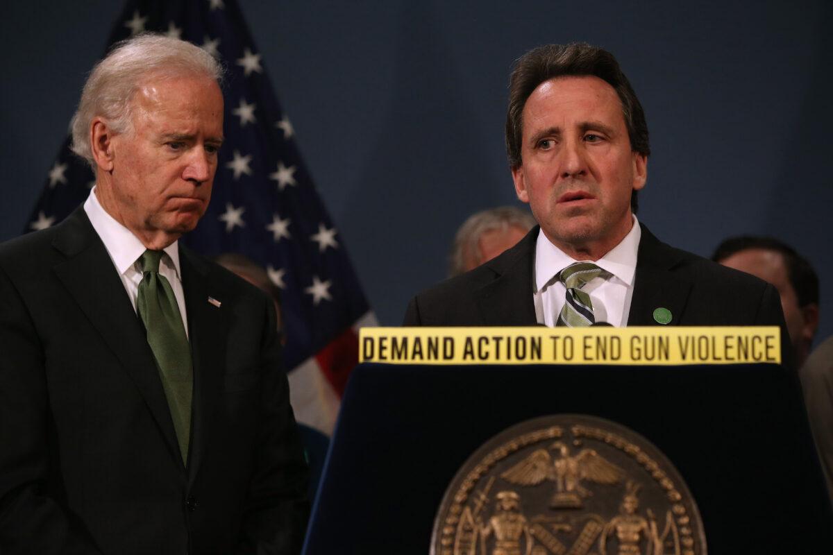 Neil Heslin (R), father of Sandy Hook shooting victim Jesse Lewis, 6, stands with Vice President Joe Biden at a press conference for gun reform in New York City on March 21, 2013. (John Moore/Getty Images)