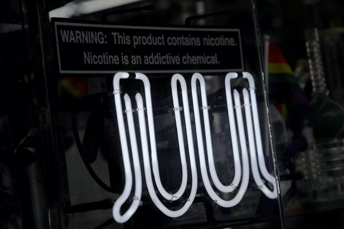 Signage for Juul vaping products is seen on a storefront in New York City on Sept. 9, 2019. (Andrew Kelly/Reuters-File)