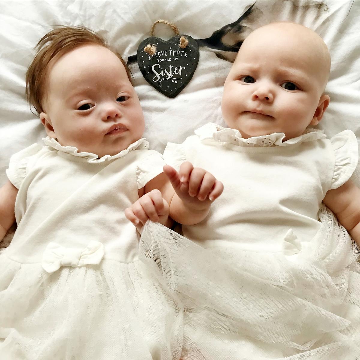 (L-R) Twins Harper Jade and Quinn Mae. (SWNS)