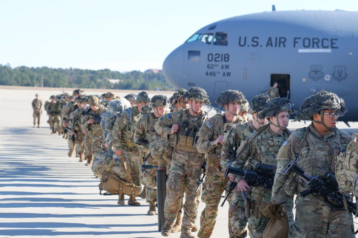U.S. Army Paratroopers of the 82nd Airborne Division, deployed from Pope Army Airfield, North Carolina, head to the U.S. Central Command area in response to events in Iraq, on Jan. 1, 2020. (Capt. Robyn Haake/U.S. Army/AFP via Getty Images)