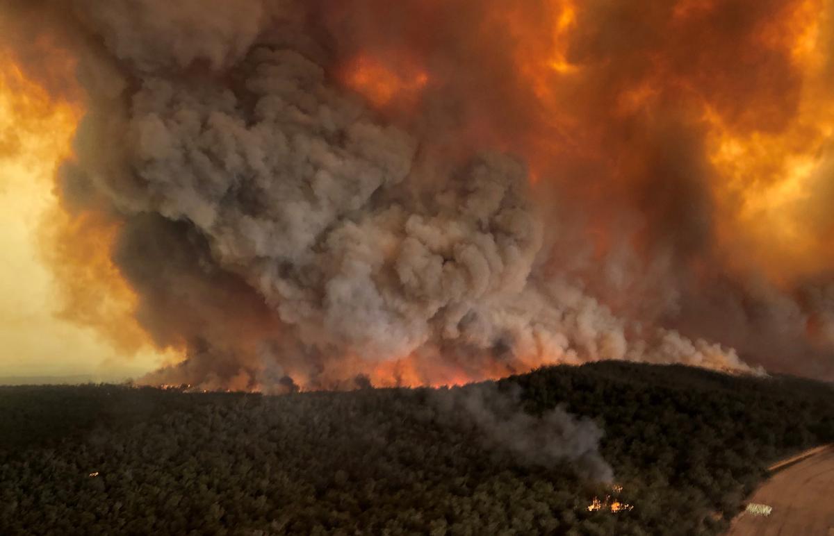 Smoke billows during bushfires in Bairnsdale, a city in East Gippsland, Victoria, Australia, Dec. 30, 2019. (Glen Morey/Social Media/via Reuters)