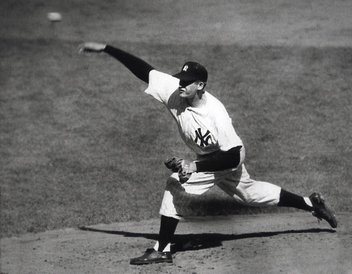 New York Yankees right-hander Don Larsen delivers a pitch in the fourth inning of Game 5 of the World Series Oct. 8, 1956 en route to the first World Series perfect game. The Yankees won 2-0 and went on to win the series. (AP Photo/File)
