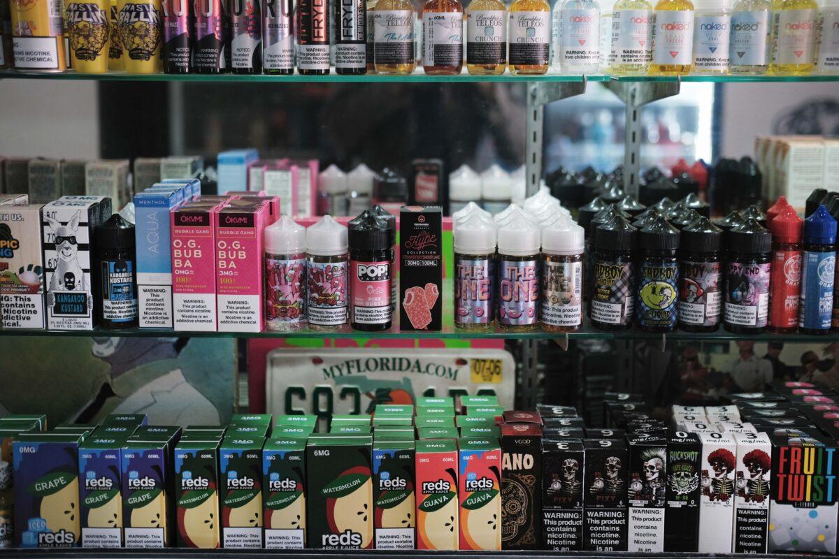 Vaping products, including flavored vape liquids and pods, are displayed at Gotham Vape in Queens, N.Y., on Sept. 17, 2019. (Spencer Platt/Getty Images)