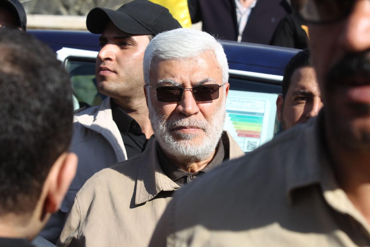 Abu Mahdi al-Muhandis, a commander in the Popular Mobilization Forces (PMF) attends the funeral procession of Hashed al-Shaabi fighters in Baghdad on Dec. 31, 2019, who were killed in US airstrikes on a base in western Iraq near al-Qaim, on the border with Syria. (Ahmad Al-Rubaye/AFP via Getty Images)