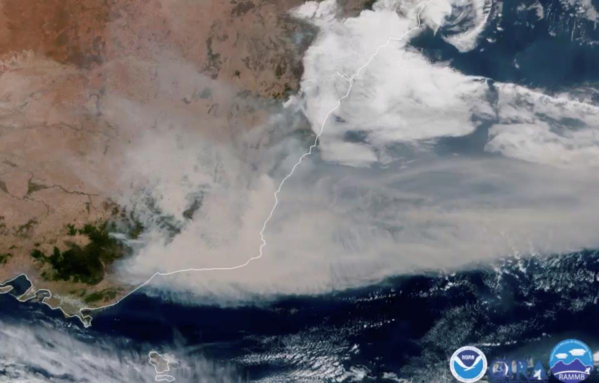 A satellite image shows bushfire smoke being blown away from Australia towards New Zealand on Jan. 2, 2020. in this screen grab obtained from a social media video. (NOAA via Reuters)