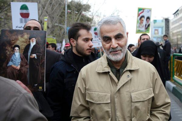 In this Thursday, Feb. 11, 2016, file photo, Qassem Soleimani, commander of Iran's Quds Force, attends an annual rally commemorating the anniversary of the 1979 Islamic revolution, in Tehran, Iran. Iraqi TV and three Iraqi officials said Friday, Jan. 3, 2020, that Gen. Qassem Soleimani, the head of Iran’s elite Quds Force, has been killed in an airstrike at Baghdad’s international airport. (AP Photo/Ebrahim Noroozi, File)
