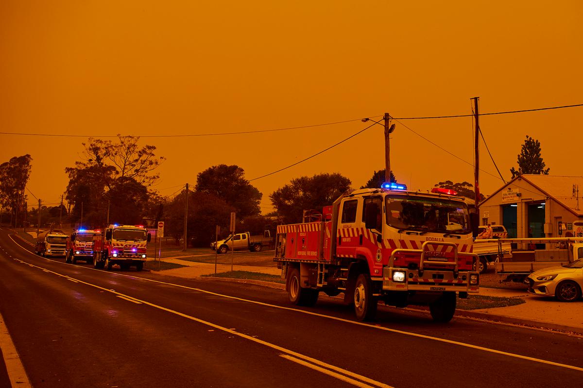 RFS Trucks gather in front of the RFS station in Bodalla, Australia, on Jan. 4, 2020. (Brett Hemmings/Getty Images)