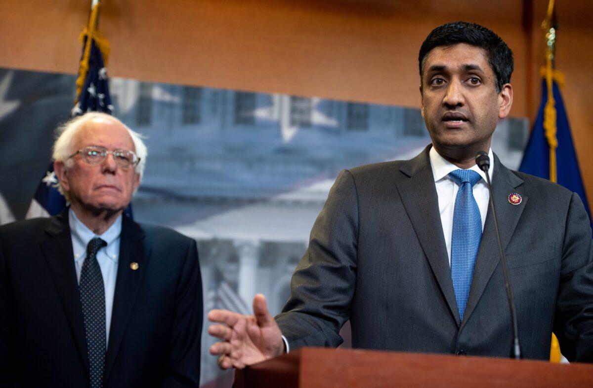 (L–R) Sen. Bernie Sanders (I-Vt.) and Rep. Ro Khanna (D-Calif.) at a press conference in Washington in April 2019. (Saul Loeb/AFP via Getty Images)