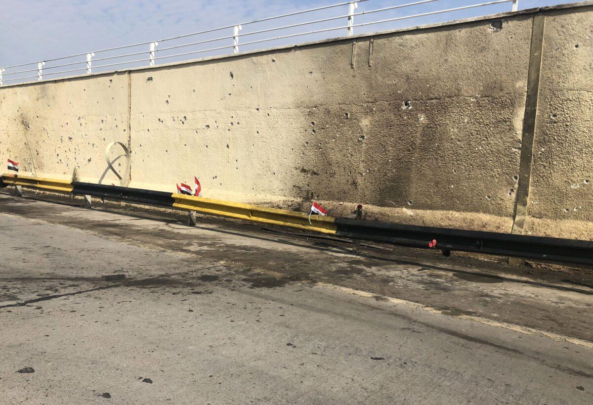 The site where top Iranian commander Qassem Soleimani and Iraqi paramilitary chief Abu Mahdi al-Muhandis were killed along with eight others in a U.S. airstrike the day before, outside the international airport road in Baghdad, Iraq., on Jan. 4, 2020. (Ali Choukeir/AFP via Getty Images)