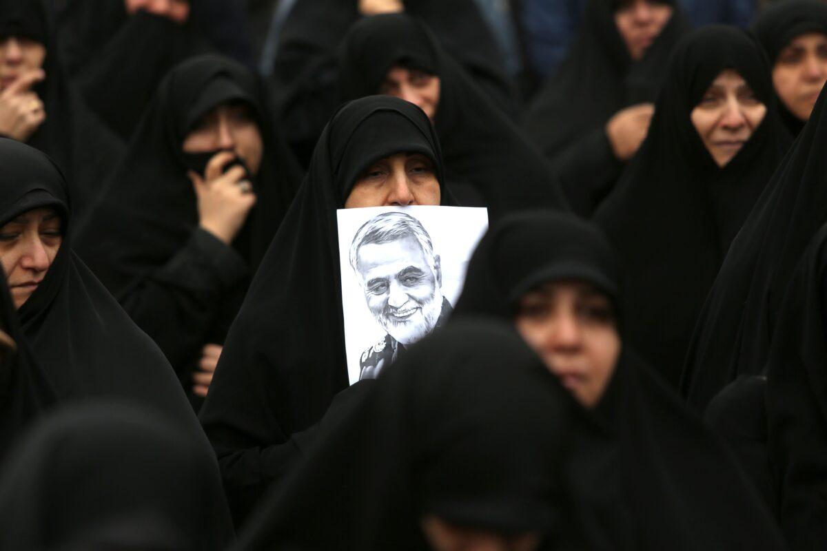 Iranian women react as they take part in an anti-U.S. rally to protest the killings of Iranian military commander Qassem Soleimani and Iraqi paramilitary chief Abu Mahdi al-Muhandis, in the capital Tehran on Jan. 4, 2020. (Atta Kenare/AFP via Getty Images)