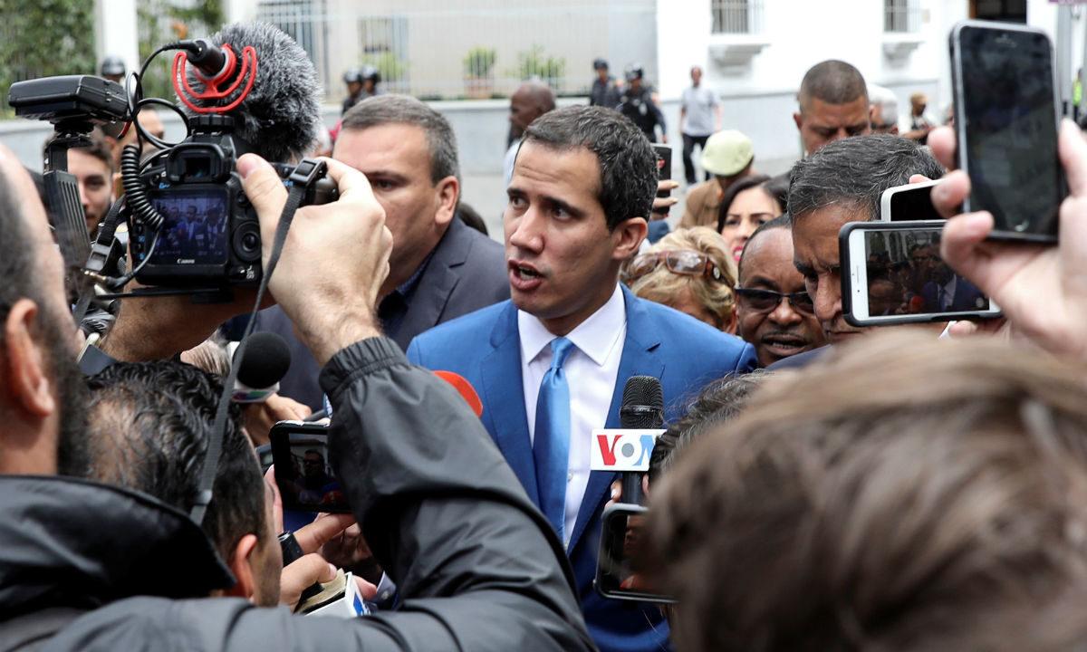 Venezuelan opposition leader Juan Guaido, who many nations have recognized as the country's rightful interim ruler, speaks to reporters outside Venezuela's National Assembly building in Caracas in Caracas, Venezuela, on Jan. 5, 2020. (Fausto Torrealba/Reuters)