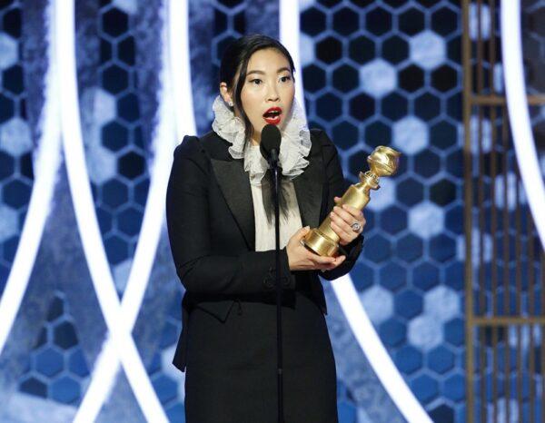 Awkwafina accepting the award for best actress in a motion picture comedy for her role in "The Farewell" at the 77th Annual Golden Globe Awards at the Beverly Hilton Hotel in Beverly Hills, Calif., on Jan. 5, 2020. (Paul Drinkwater/NBC via AP)