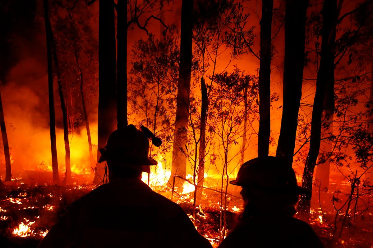 Fire safety crews monitor fires and begin backburns between the towns of Orbost and Lakes Entrance in east Gippsland, Australia, on Jan. 2, 2020. (©Getty Images | <a href="https://www.gettyimages.com/detail/news-photo/and-cfa-crews-monitor-fires-and-begin-back-burns-between-news-photo/1197811922?adppopup=true">Darrian Traynor</a>)