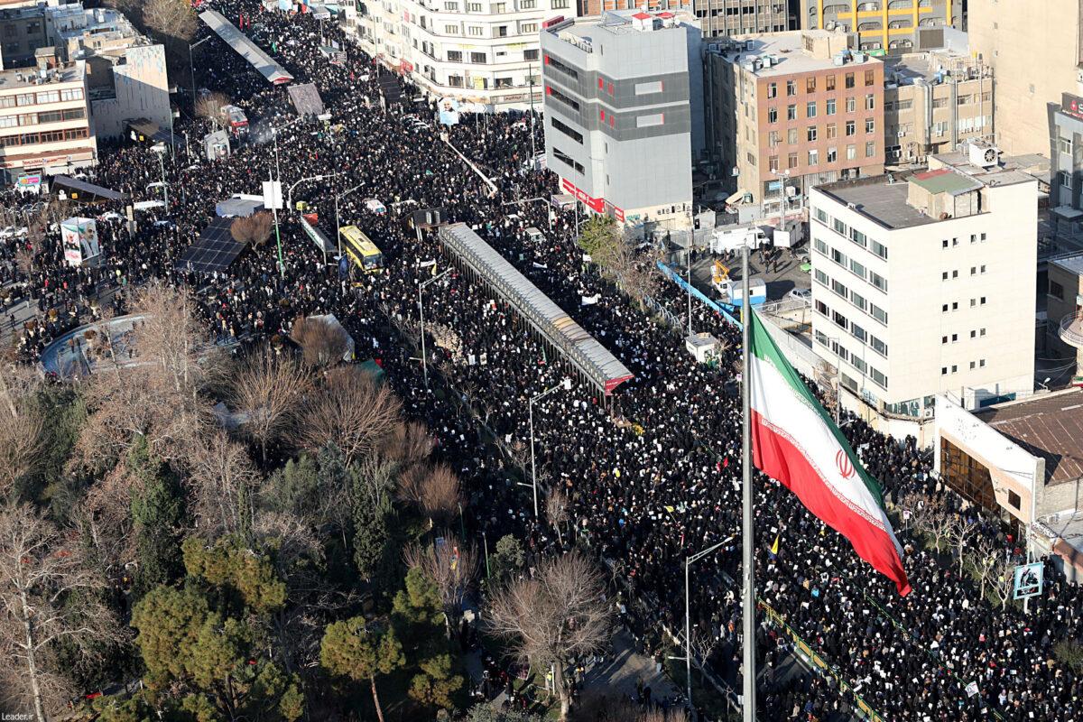 People attend a funeral procession for Iranian Maj. Gen. Qassem Soleimani, head of the elite Quds Force and Iraqi militia commander Abu Mahdi al-Muhandis, who were killed in an airstrike at Baghdad airport, in Tehran, Iran on Jan. 6, 2020. (Official Khamenei website/Handout via Reuters)