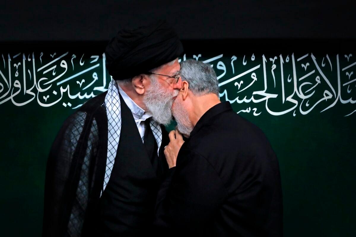 Supreme Leader Ayatollah Ali Khamenei kisses Iranian Gen. Qassem Soleimani during a religious ceremony in Tehran, Iran, in this Sept. 30, 2017 photo, re-released Jan. 3, 2020, by an official website of the office of the Iranian supreme leader. (Office of the Iranian Supreme Leader via AP)