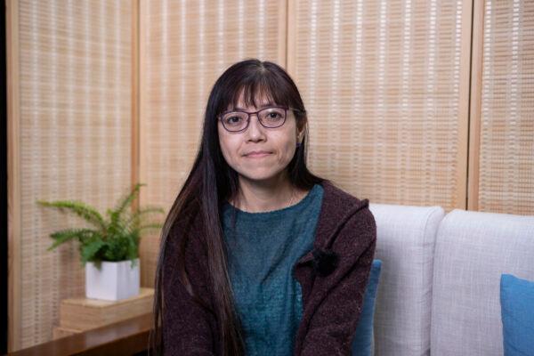 Ah Ming, Hong Kong social worker, at a studio in Hong Kong on Dec. 20, 2019. (Yu Gang/The Epoch Times)