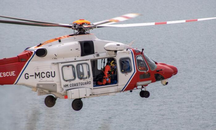 Coastguard Helicopter in Flight Training Helps Save Dog From Being Swept Out to the Sea