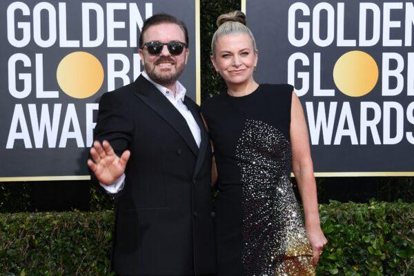British host Ricky Gervais (L) and partner Jane Fallon arrive for the 77th annual Golden Globe Awards at The Beverly Hilton hotel in Beverly Hills, Calif., on Jan. 5, 2020. (Valerie Macon/AFP/Getty Images)