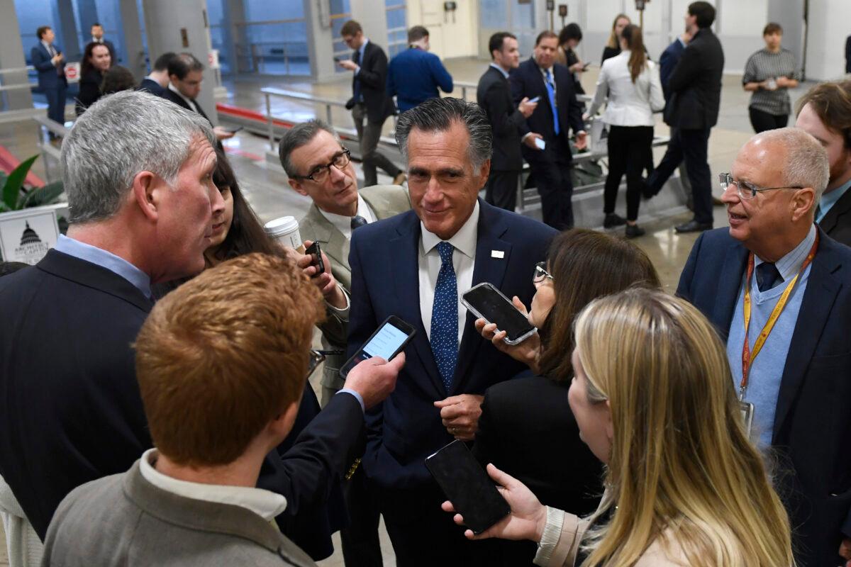 Sen. Mitt Romney (R-Utah) talks to reporters on Capitol Hill in Washington on Dec. 17, 2019. (Susan Walsh/AP Photo)