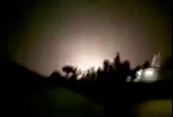 An explosion is seen following missiles landing at what is believed to be Ain al-Asad Air Base in Iraq, in this still image taken from a video shot on Jan. 8, 2020. (Iran Press/Handout via Reuters)