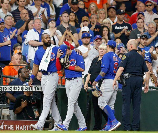 Albert Almora (R) the Chicago Cubs player is comforted by his teammate (L) after checking on the young child that was injured by a hard-foul ball off his bat in the fourth inning against the Houston Astros at Minute Maid Park, in Houston, Texas, on May 29, 2019. (Bob Levey/Getty Images)