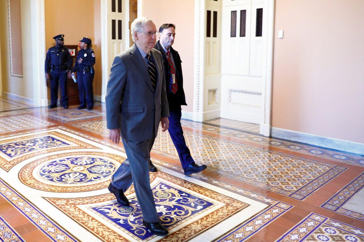 Senate Majority Leader Mitch McConnell (R-Ky.) walks to his office at the U.S. Capitol in Washington on Jan. 9, 2020. (Tom Brenner/Reuters)