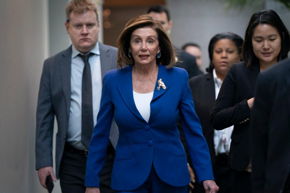 House Speaker Nancy Pelosi (D-Calif.) arrives to meet with other House Democrats on the morning following Iranian attacks on bases in Iraq housing U.S. troops, at the Capitol in Washington on Jan. 8, 2020. (J. Scott Applewhite/AP Photo)