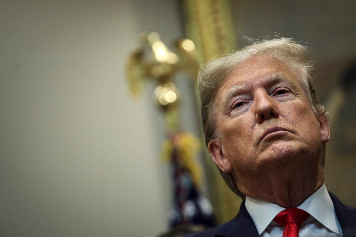 President Donald Trump looks on during an event to unveil significant changes to the National Environmental Policy Act, in the Roosevelt Room of the White House in Washington on Jan. 8, 2020. (Drew Angerer/Getty Images)