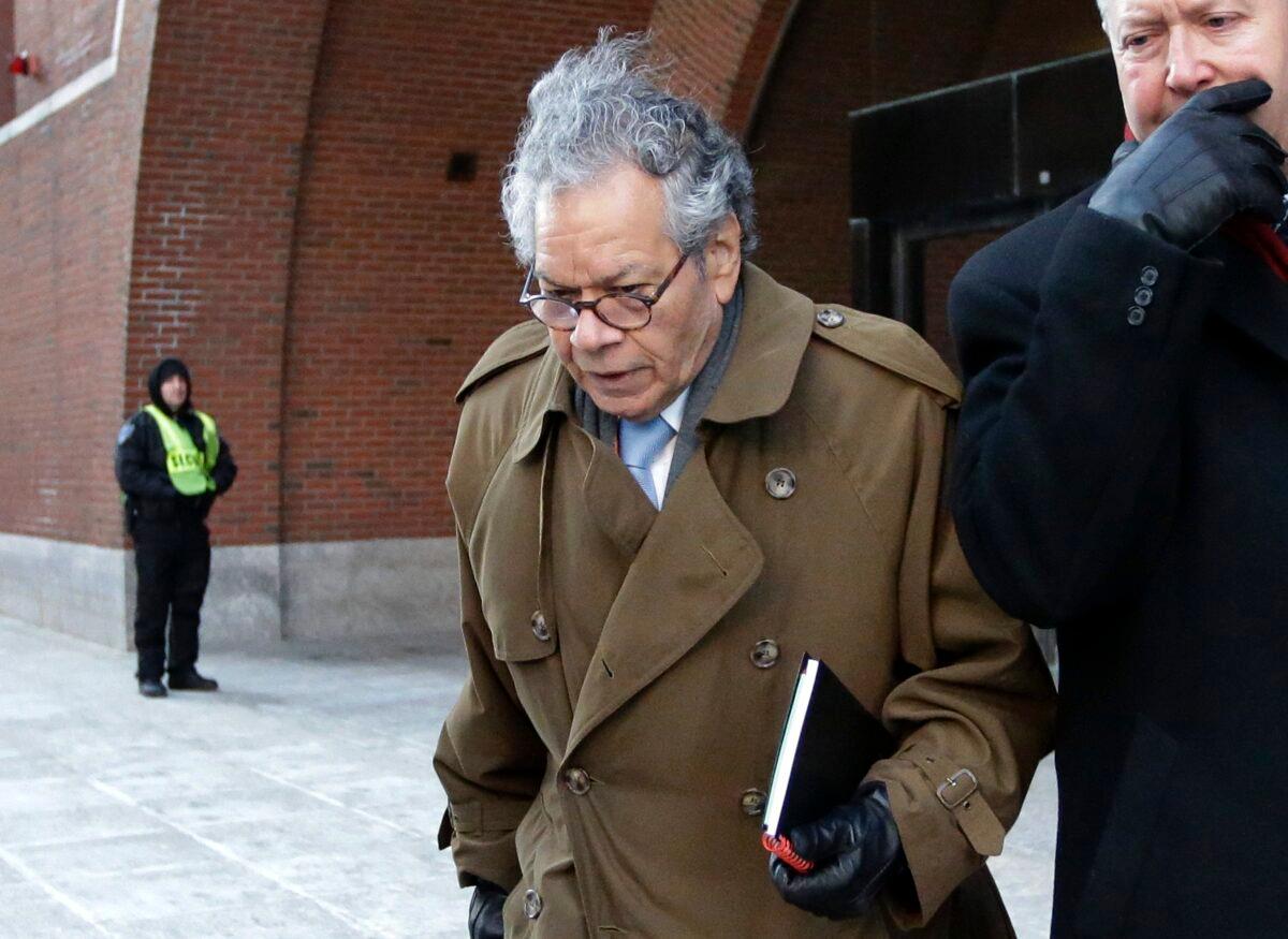 In this Jan. 30, 2019, file photo, Insys Therapeutics founder John Kapoor leaves federal court in Boston. (Steven Senne/AP Photo)