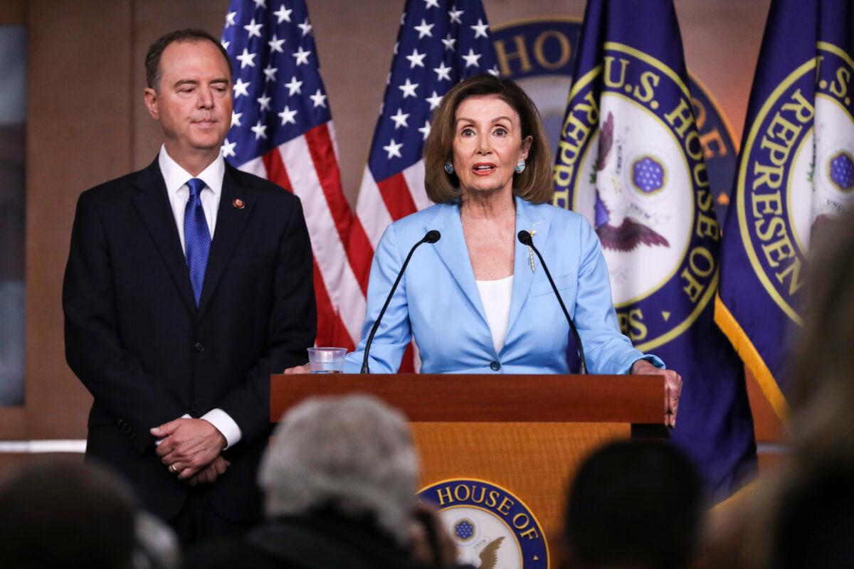 House Speaker Nancy Pelosi (D-Calif.) and Rep. Adam Schiff (D-Calif.), House intelligence chairman, hold a press conference about the impeachment inquiry of President Donald Trump, at the Capitol in Washington on Oct. 2, 2019. (Charlotte Cuthbertson/The Epoch Times)